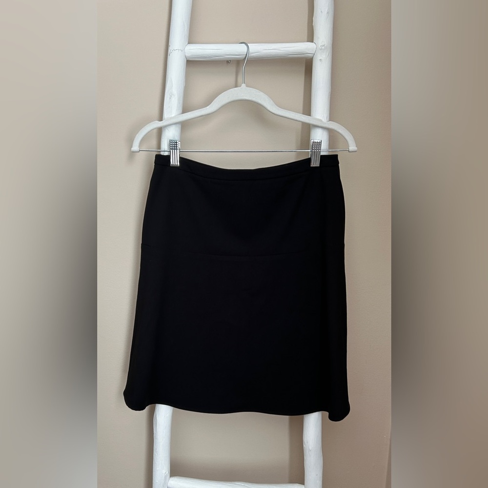Size 4 black Calvin Klein shirt.